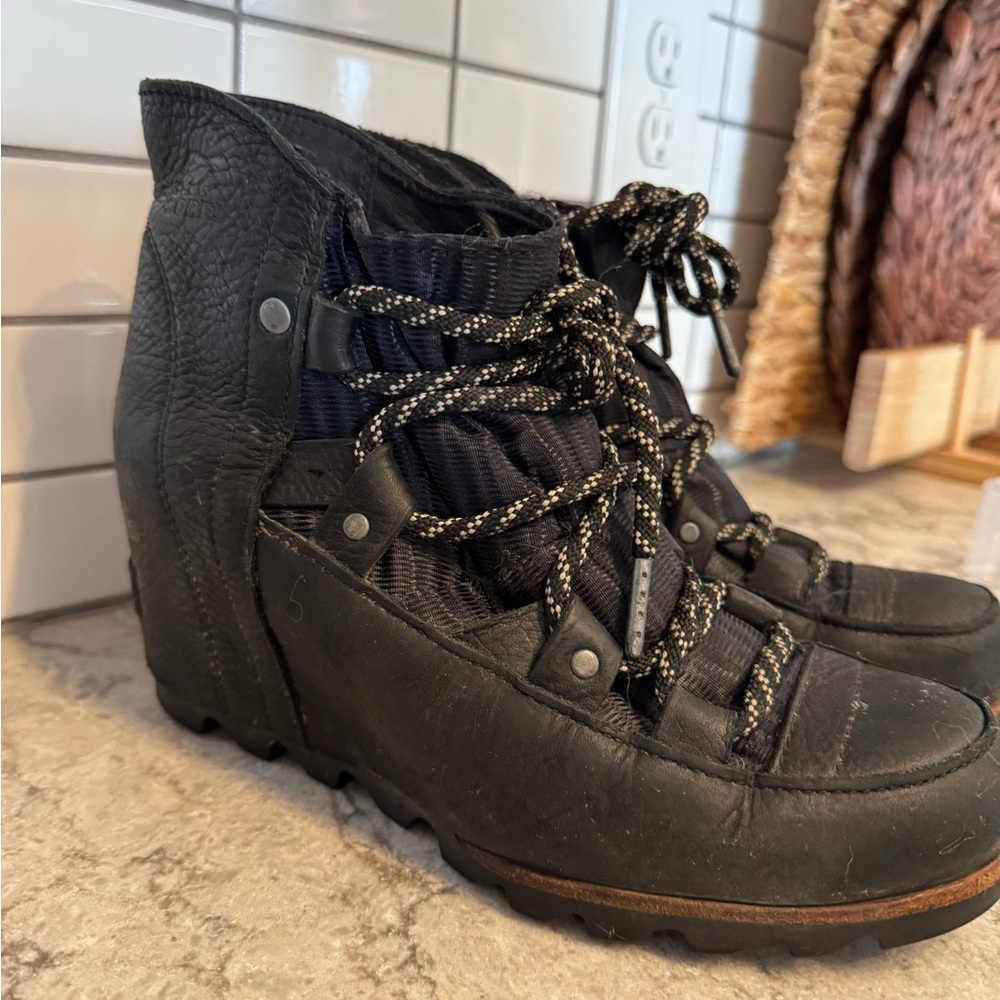Sorel Black Wedge booties with Durable Material and Thick Sole